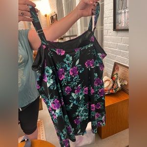 25% off listed price. Plus size one piece women’s swimsuit. Multicolored.